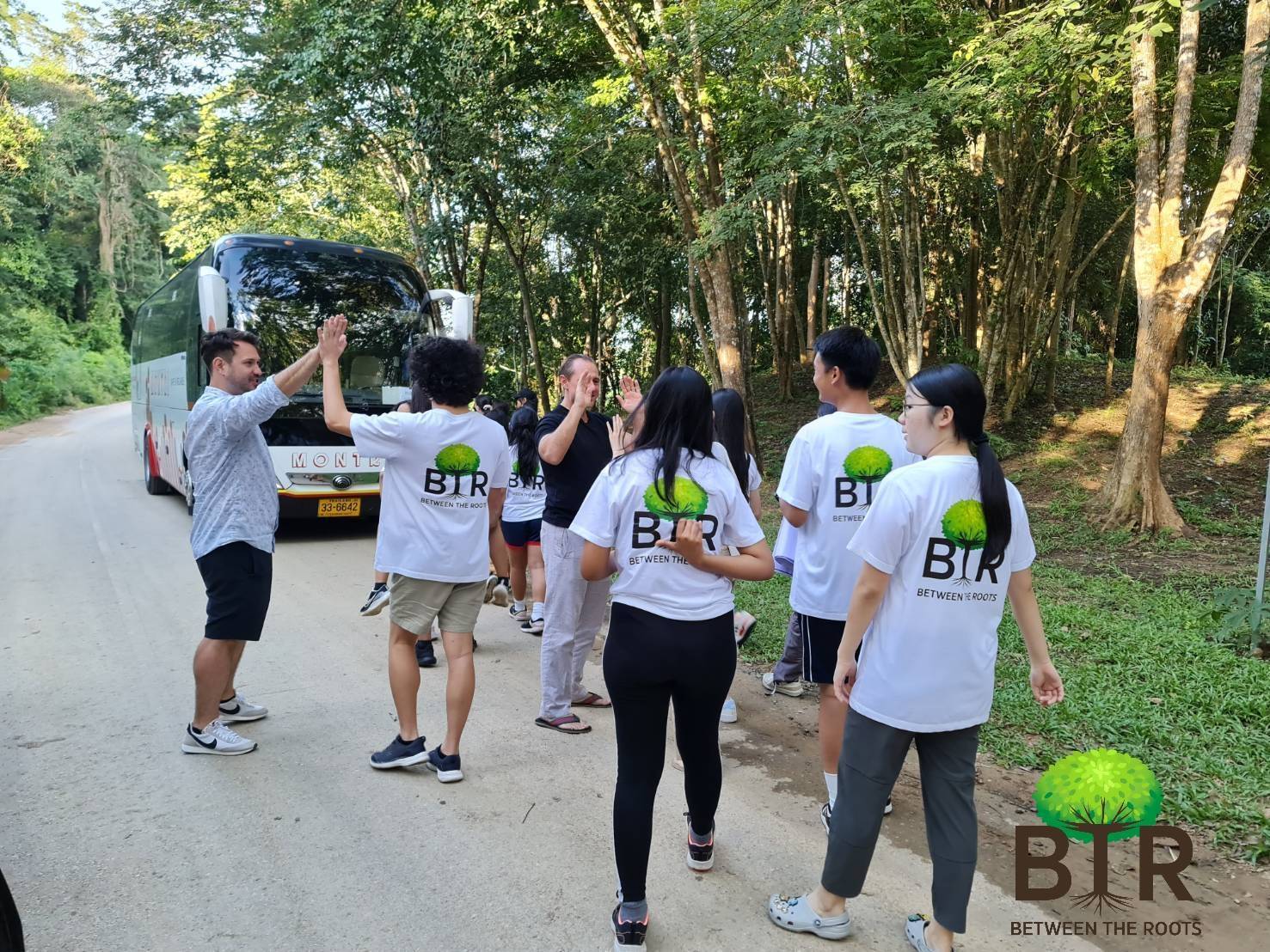 BTR volunteers walking down a rural road